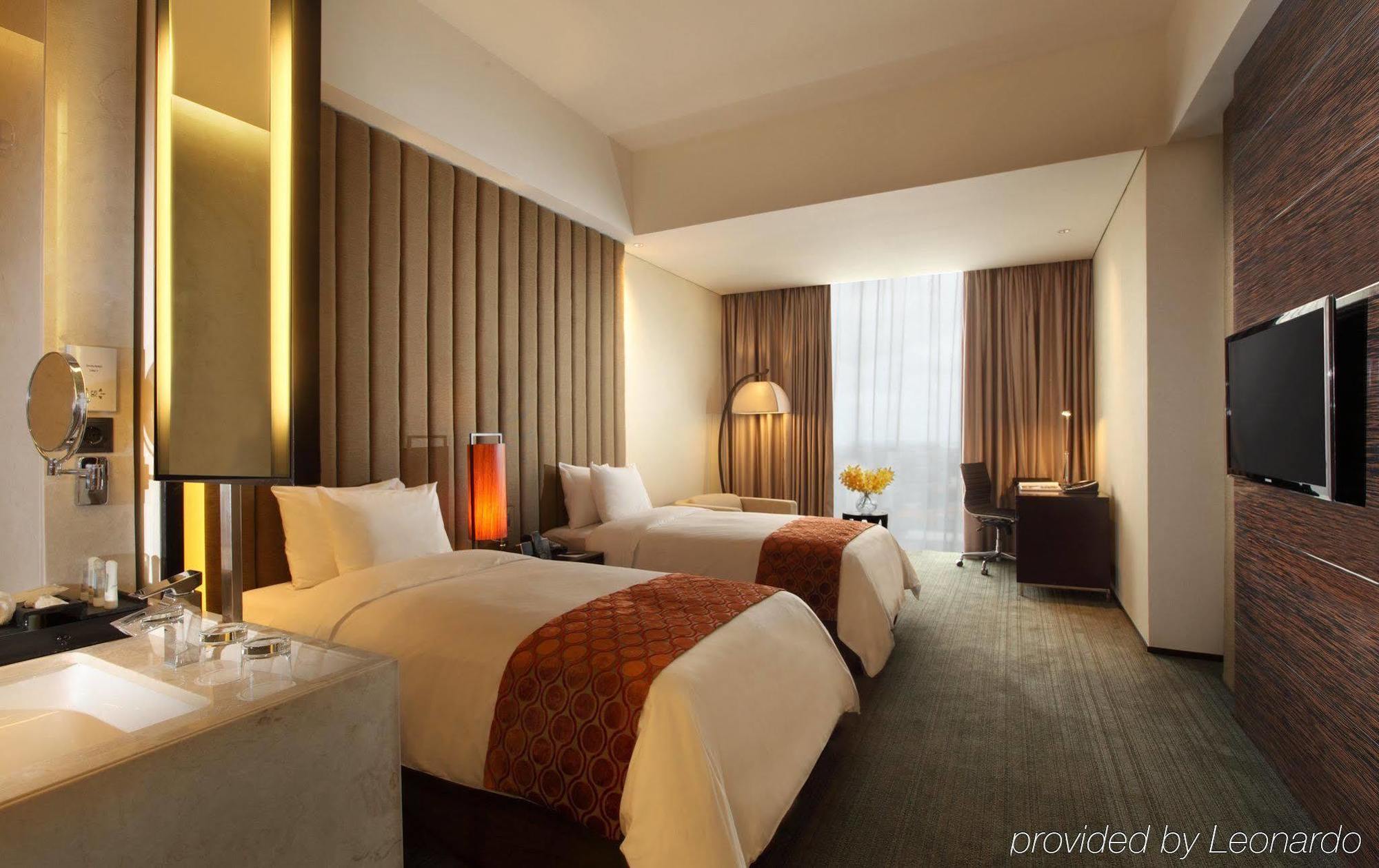 Po Hotel Семаранг Номер фото